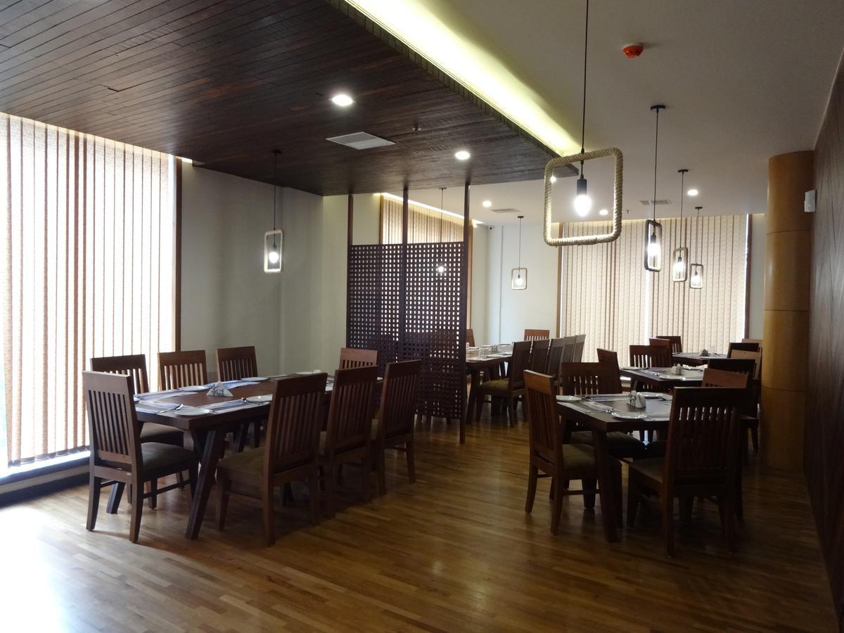 Woodies Bleisure Hotel Kozhikode Extérieur photo