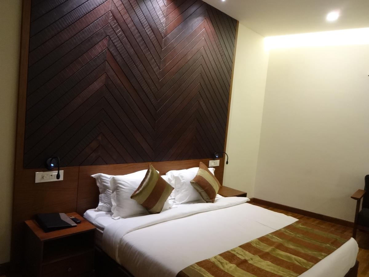 Woodies Bleisure Hotel Kozhikode Extérieur photo